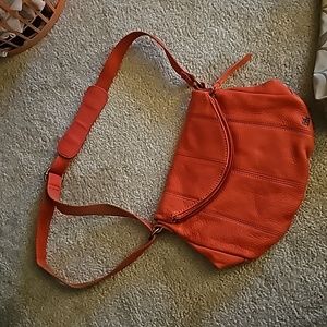 The SAK brand leather crossbody purse